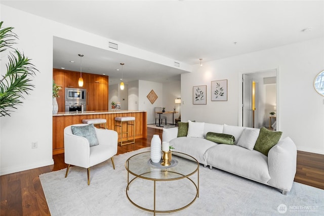 10700 NE 4th St Unit 806, Bellevue, WA 98004 - living area with dark wood-type flooring and recessed lighting