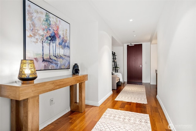 10700 NE 4th St Unit 806, Bellevue, WA 98004 - corridor with wood finished floors and recessed lighting
