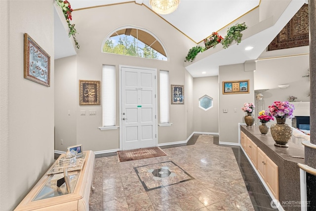 10316 NE 153rd Pl, Bothell, WA 98011 - entryway with high vaulted ceiling, baseboards, and marble tiled floors