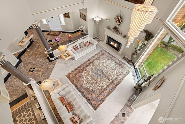 10316 NE 153rd Pl, Bothell, WA 98011 - living room featuring a glass covered fireplace and a towering ceiling