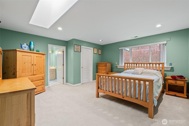10316 NE 153rd Pl, Bothell, WA 98011 - bedroom with a skylight, light colored carpet, recessed lighting, baseboards, and ensuite bathroom
