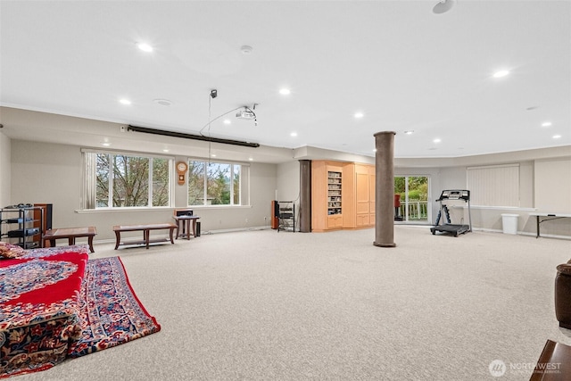 10316 NE 153rd Pl, Bothell, WA 98011 - carpeted living area with decorative columns, healthy amount of natural light, recessed lighting, and baseboards