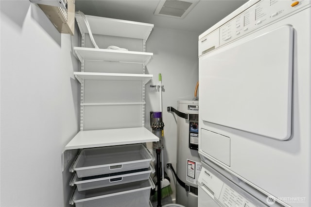 525 Belmont Ave E Unit 4F, Seattle, WA 98102 - spacious closet featuring estacked washer and dryer and water heater