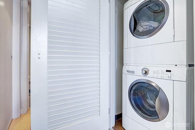 909 5th Ave Unit 1103, Seattle, WA 98164 - laundry area with stacked washing machine and dryer