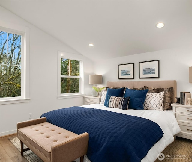 13434 HS3 NE 112th Pl, Redmond, WA 98052 - bedroom featuring multiple windows, wood finished floors, lofted ceiling, recessed lighting, and baseboards