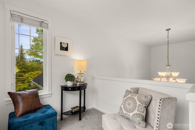 7645 Dogwood Ln SE, Snoqualmie, WA 98065 - living area featuring a chandelier and carpet flooring