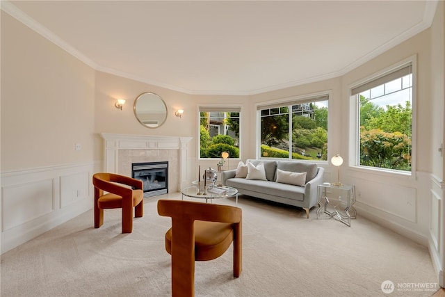 8228 NE 187th Way, Kenmore, WA 98028 - living area featuring light colored carpet, ornamental molding, healthy amount of natural light, a tiled fireplace, and a decorative wall