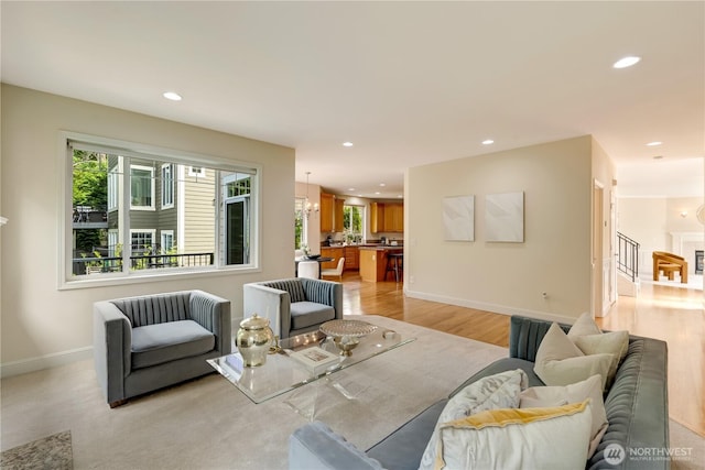 8228 NE 187th Way, Kenmore, WA 98028 - living area featuring recessed lighting, light wood finished floors, and stairs