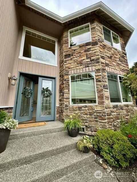 8228 NE 187th Way, Kenmore, WA 98028 - property entrance featuring stone siding