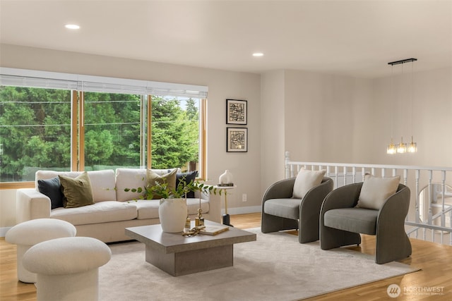 539 129th Ave SE, Bellevue, WA 98005 - living area with light wood-style flooring, recessed lighting, and a chandelier