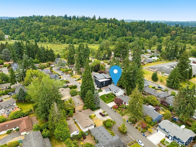 539 129th Ave SE, Bellevue, WA 98005 - aerial view of property's location featuring nearby suburban area and a heavily wooded area