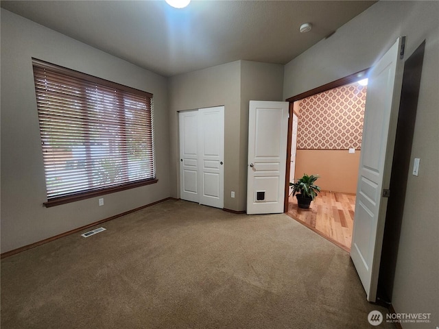8318 55th Ave SE, Olympia, WA 98513 - unfurnished bedroom with carpet floors and a closet