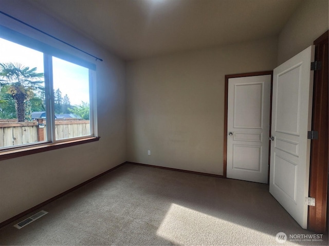 8318 55th Ave SE, Olympia, WA 98513 - carpeted empty room featuring baseboards