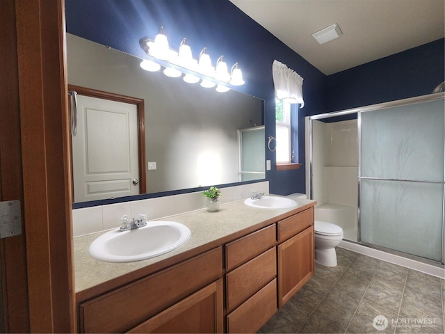 8318 55th Ave SE, Olympia, WA 98513 - bathroom featuring double vanity and a stall shower