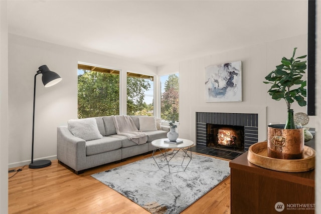 2127 170th Ave NE, Bellevue, WA 98008 - living area with a brick fireplace and wood finished floors