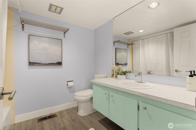 2127 170th Ave NE, Bellevue, WA 98008 - full bathroom featuring vanity, recessed lighting, wood finished floors, a shower with shower curtain, and a bath