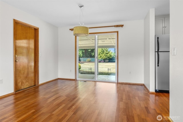 1103 Fieldcrest Ave, Centralia, WA 98531 - unfurnished room featuring wood finished floors and baseboards