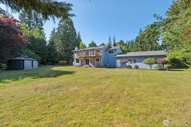 3028 124th St SE, Everett, WA 98208 - view of grassy yard featuring a shed and a deck