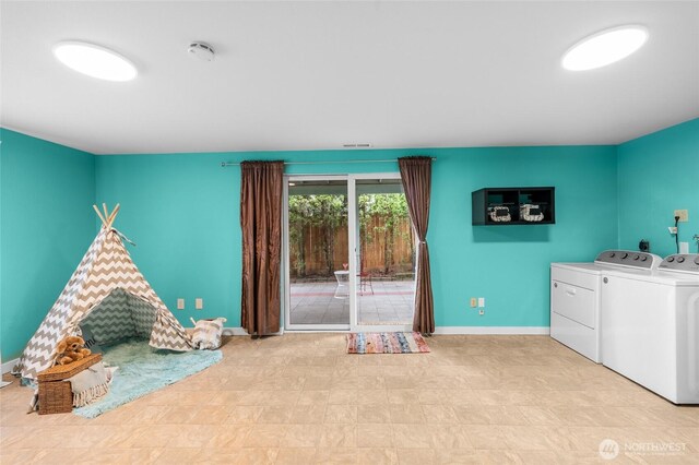 3910 Westpark Ct NW, Olympia, WA 98502 - playroom with washing machine and dryer and tile patterned floors