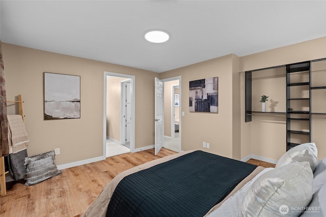 3910 Westpark Ct NW, Olympia, WA 98502 - bedroom featuring wood finished floors and baseboards