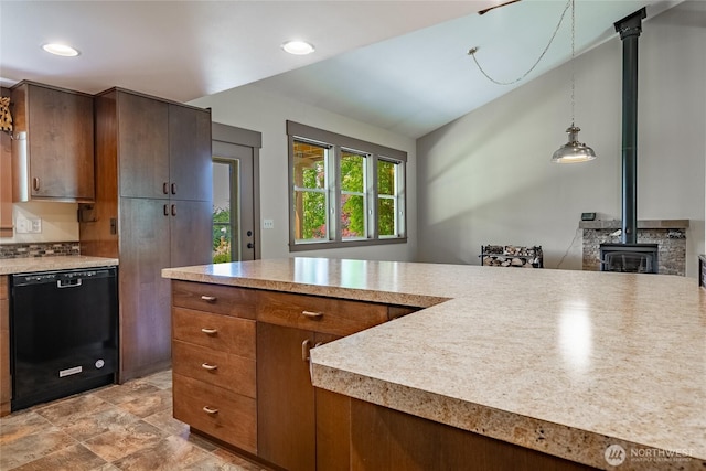 9206 Delta Line Rd, Custer, WA 98240 - kitchen with dishwasher, a wood stove, light countertops, decorative light fixtures, and recessed lighting