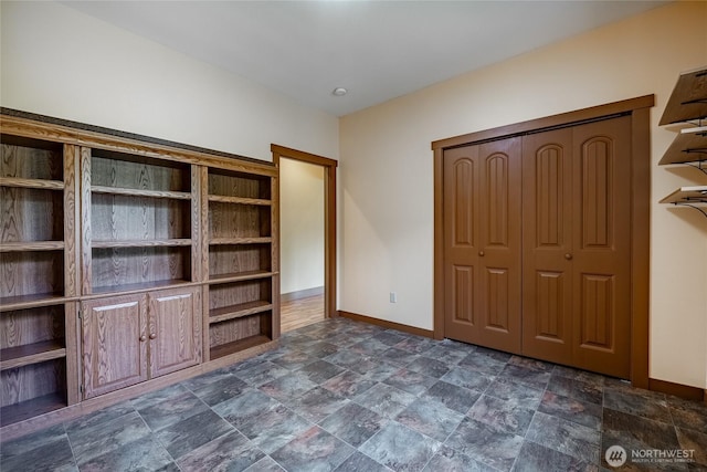 9206 Delta Line Rd, Custer, WA 98240 - unfurnished bedroom with stone finish flooring and a closet