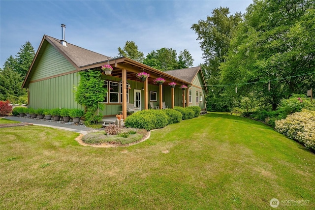 9206 Delta Line Rd, Custer, WA 98240 - view of property exterior with board and batten siding and a lawn