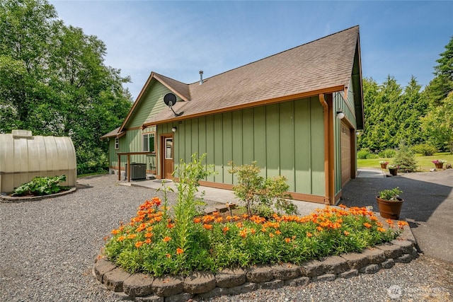 9206 Delta Line Rd, Custer, WA 98240 - view of side of home featuring board and batten siding and a shingled roof