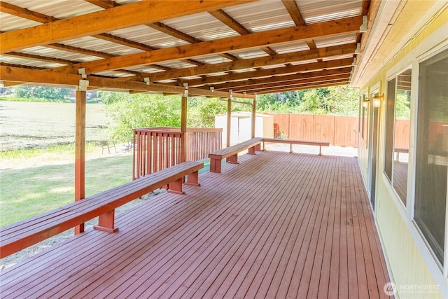 10410 206th Ave E, Bonney Lake, WA 98391 - wooden terrace featuring a storage shed and a lawn