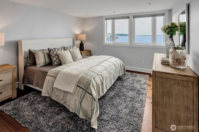 3717 Beach Dr SW Unit 207, Seattle, WA 98116 - bedroom with wood finished floors and baseboards