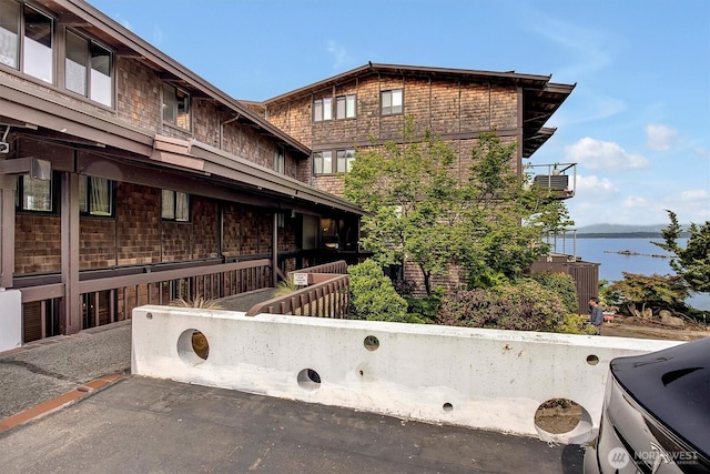 3717 Beach Dr SW Unit 207, Seattle, WA 98116 - exterior space featuring a water view