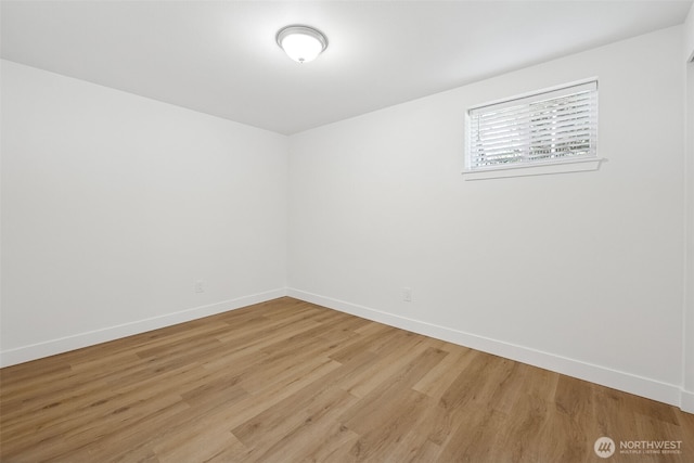 12820 E 129th St, Puyallup, WA 98374 - empty room with baseboards and light wood-style floors