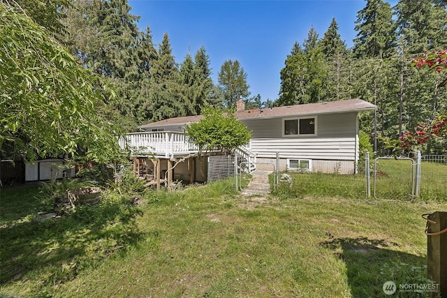 12820 E 129th St, Puyallup, WA 98374 - rear view of property featuring a deck and a chimney