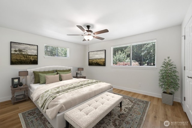 12820 E 129th St, Puyallup, WA 98374 - bedroom featuring light wood-type flooring and a ceiling fan