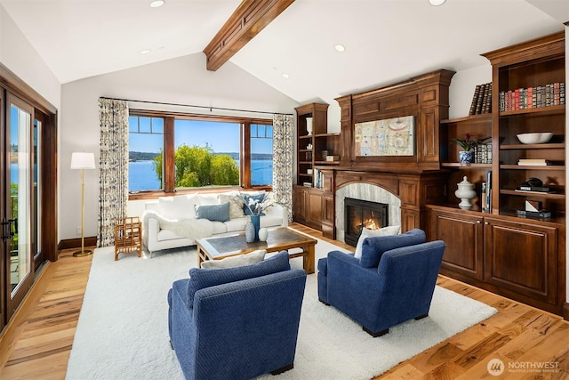 8260 Avalon Dr, Mercer Island, WA 98040 - living area featuring light wood-style floors, a premium fireplace, and recessed lighting