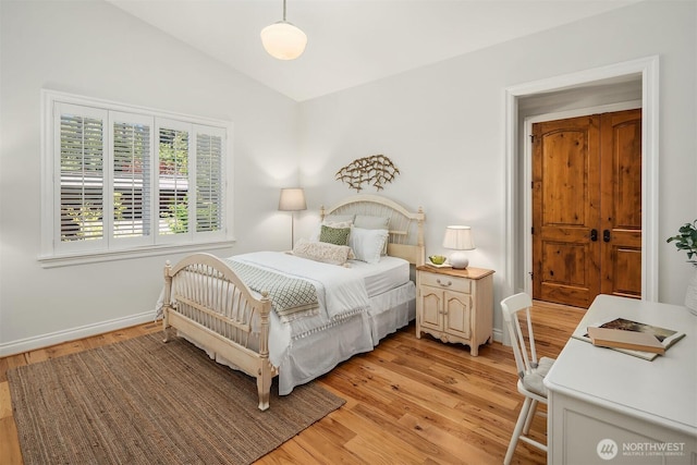 8260 Avalon Dr, Mercer Island, WA 98040 - bedroom featuring light wood-style flooring, lofted ceiling, and baseboards
