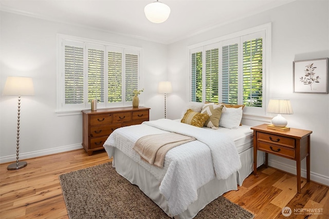 8260 Avalon Dr, Mercer Island, WA 98040 - bedroom with light wood-style flooring and baseboards