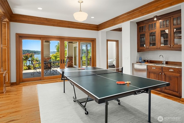 8260 Avalon Dr, Mercer Island, WA 98040 - playroom featuring french doors, plenty of natural light, light wood finished floors, and recessed lighting