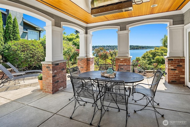 8260 Avalon Dr, Mercer Island, WA 98040 - view of patio / terrace with a water view and outdoor dining area