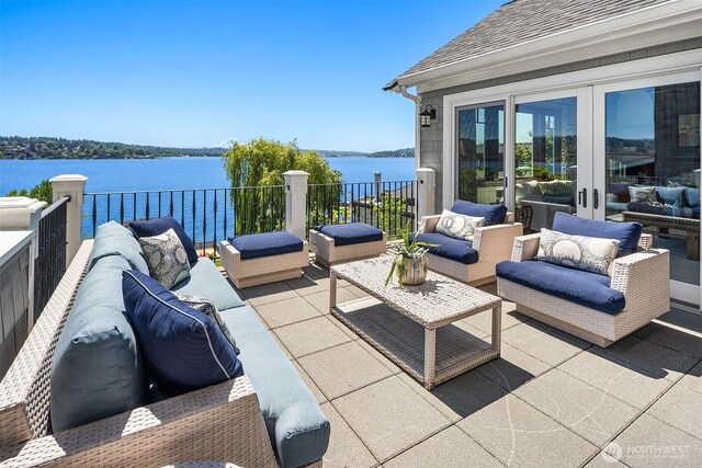 8260 Avalon Dr, Mercer Island, WA 98040 - view of patio / terrace with an outdoor hangout area, a water view, and a balcony
