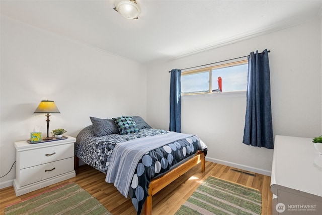 4919 N 31st St, Tacoma, WA 98407 - bedroom with baseboards and light wood-type flooring