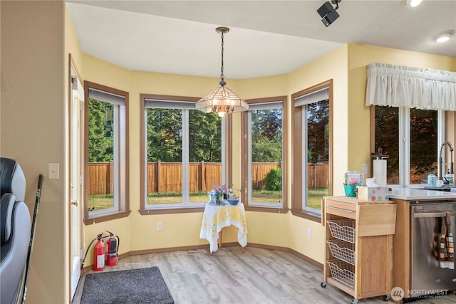 6610 227th Street Ct E, Spanaway, WA 98387 - dining area featuring light wood-style flooring and washer / dryer