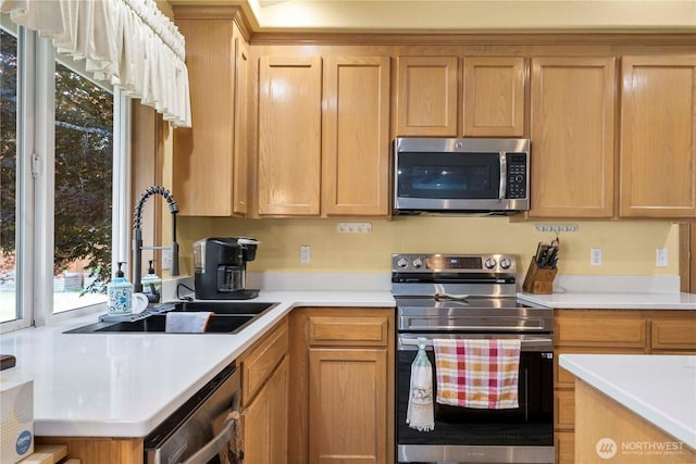 6610 227th Street Ct E, Spanaway, WA 98387 - kitchen featuring stainless steel appliances and light countertops