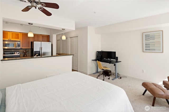 1545 NW 57th St Unit 423, Seattle, WA 98107 - bedroom with stainless steel refrigerator with ice dispenser, light carpet, and baseboards