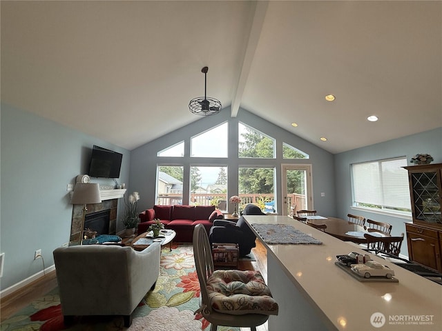 762 Evergreen Ave SE, Ocean Shores, WA 98569 - living room featuring a fireplace, wood finished floors, and recessed lighting