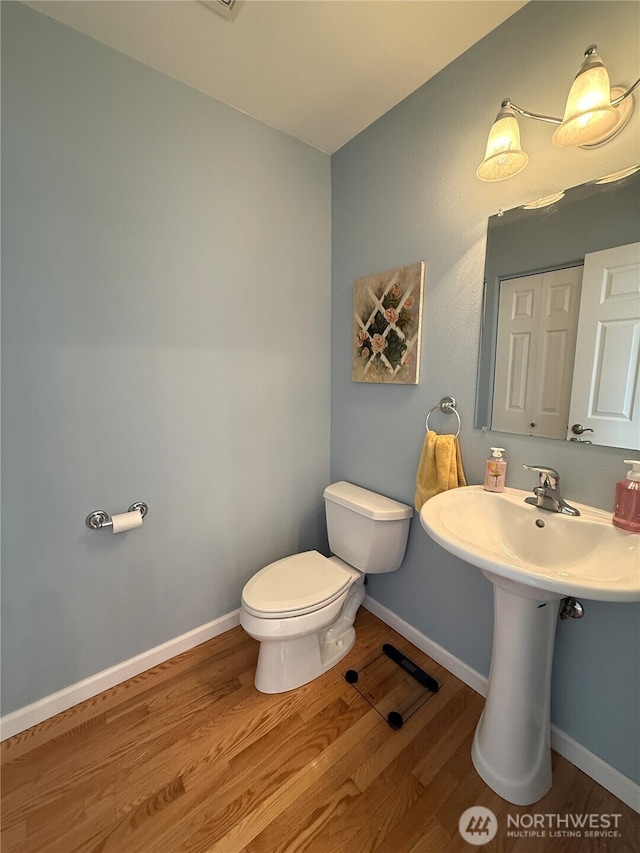 762 Evergreen Ave SE, Ocean Shores, WA 98569 - half bath with toilet and wood finished floors