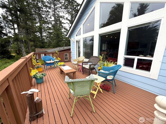 762 Evergreen Ave SE, Ocean Shores, WA 98569 - wooden terrace featuring outdoor lounge area