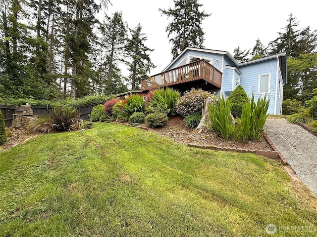 762 Evergreen Ave SE, Ocean Shores, WA 98569 - view of yard featuring a deck