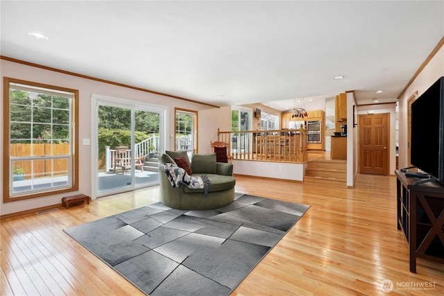 1612 SW 304th St, Federal Way, WA 98023 - living room with light wood finished floors and crown molding