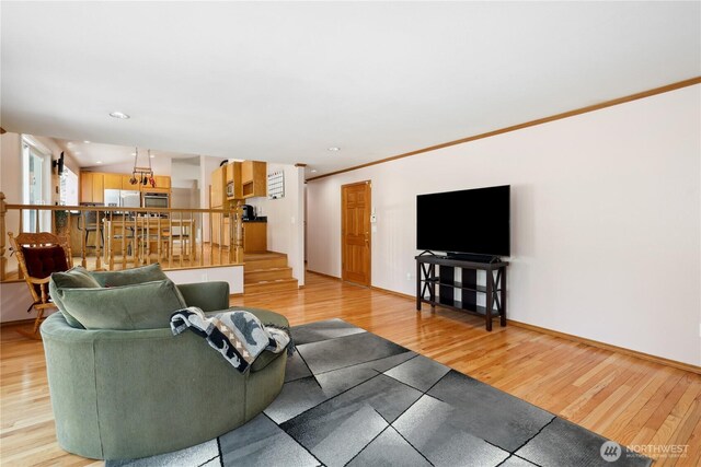 1612 SW 304th St, Federal Way, WA 98023 - living area featuring light wood-style floors, stairs, ornamental molding, and recessed lighting